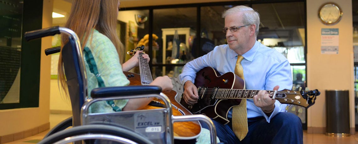 Gift of guitars creates harmony for young patients