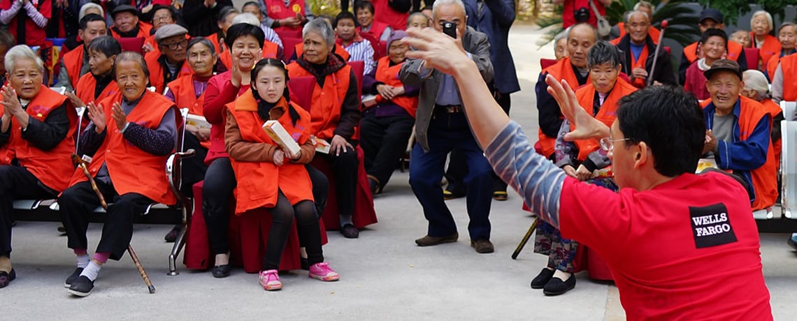 Spreading smiles, and support, among China’s elderly
