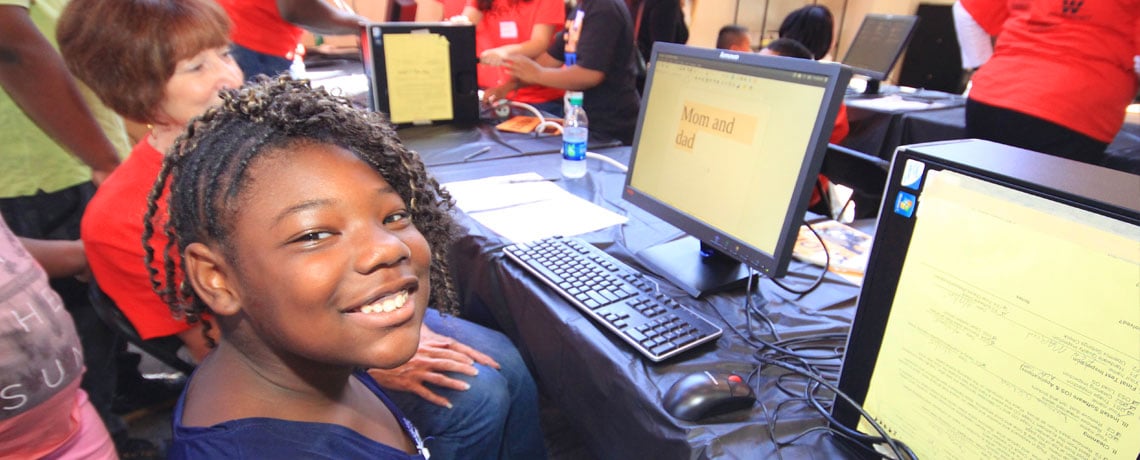 Volunteers ‘get their geek on’ to refurbish computers for students